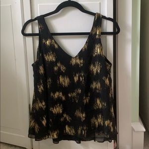 Pretty black and gold top size S!